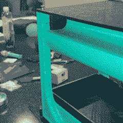 GIF of an electromechanical device accepting a syringe before dispensing another with a rotating wheel.