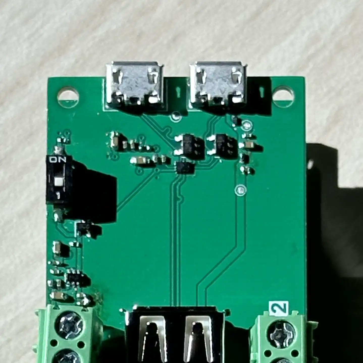 Image of a populated printed circuit board with three USB differential pairs