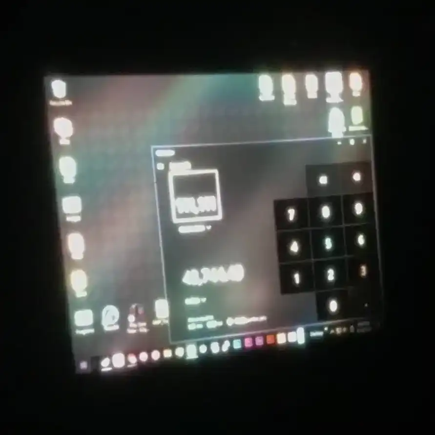 Image of a shrunken windows desktop projected onto a surface